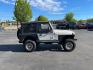 1997 Jeep Wrangler Sport (1J4FY19S4VP) with an 4.0L L6 OHV 12V engine, 5spd Manual transmission, located at 813 E Fairview Ave, Meridian , ID, 83642, (208) 336-8230, 43.618851, -116.384010 - Photo#4